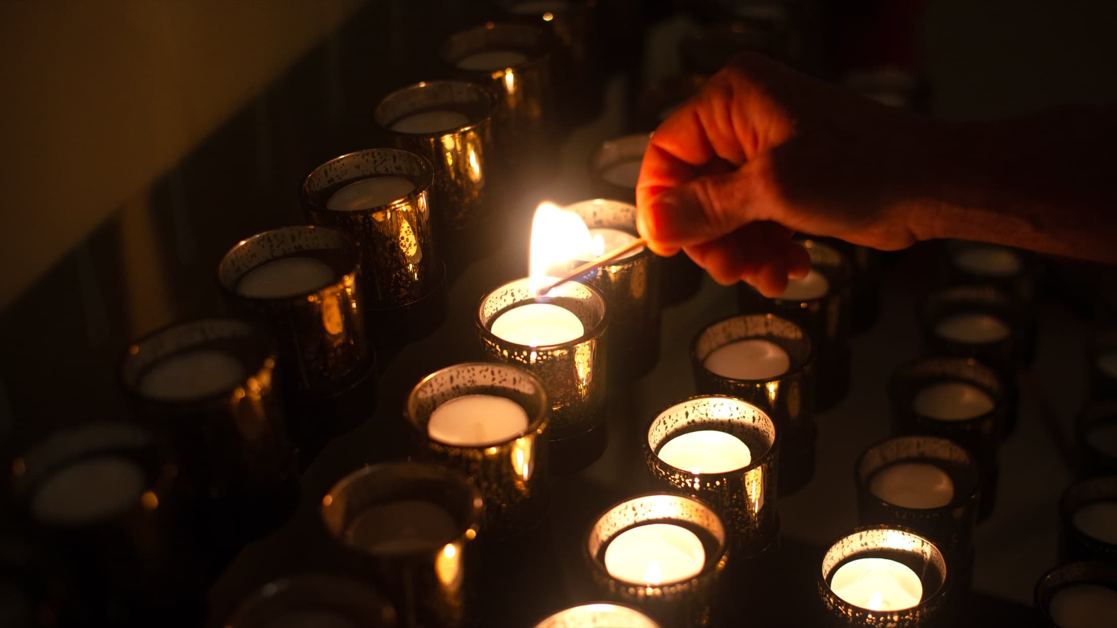 Candles and educational materials inside The Living Church chapel